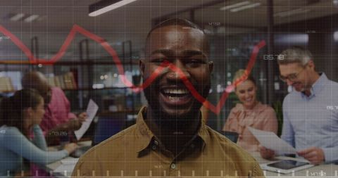 Diverse Team Working with Financial Data Charts at Office