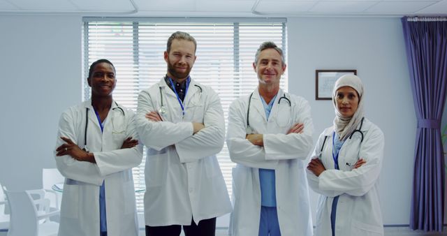 Smiling Medical Team Standing in Clinic Office - Download Free Stock Images Pikwizard.com