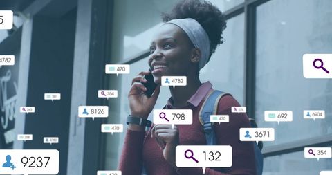 Smiling woman on smartphone surrounded by social media icons