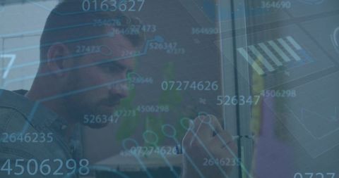 Caucasian Businessman Analyzing Data with Digital Interface Overlay - Download Free Stock Images Pikwizard.com