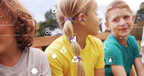 Children engaging with eco technology interface outdoors