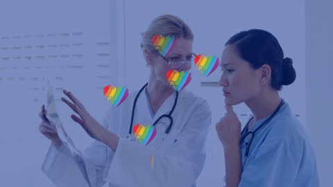 Doctors Collaborating with Heart Graphics Overlay