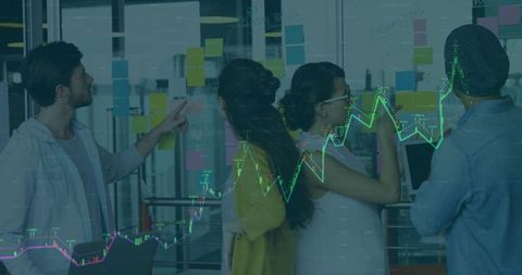 Team Brainstorming Ideas on Glass Board with Data Chart Overlay
