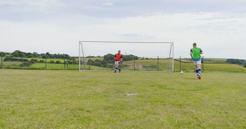 Dynamic outdoor soccer practice in countryside setting