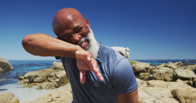 Joyful Senior African American Man Laughing by the Beach - Download Free Stock Images Pikwizard.com