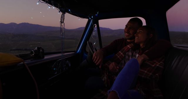 Young Couple Enjoying Romantic Evening in Car with Mountain View - Download Free Stock Images Pikwizard.com