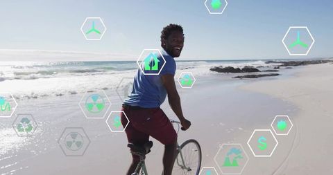 Eco-Conscious Cycling by Beach With Sustainable Icons Overlay