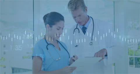 Medical Professionals Discussing Patient Data with Digital Interface