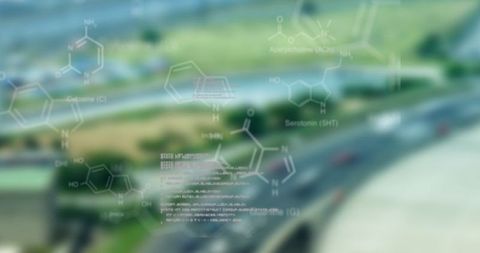 Futuristic data visualization over highway with molecular diagrams