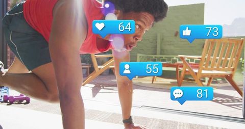 Man doing intense patio workout at sliding door with social media notification bubbles