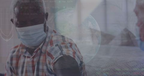 African American Man Receiving Vaccine Amid Global Data Graphics