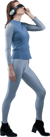 Woman in Futuristic Attire Using Transparent VR Headset Experience