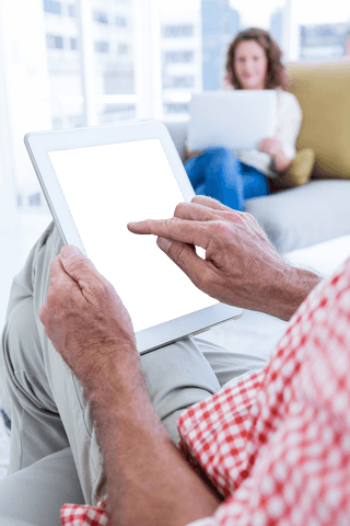 Senior Man with Transparent Tablet at Modern Office - Download Free Stock Videos Pikwizard.com