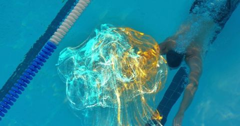 Swimmer Gliding Underwater with Dynamic Light Swirls