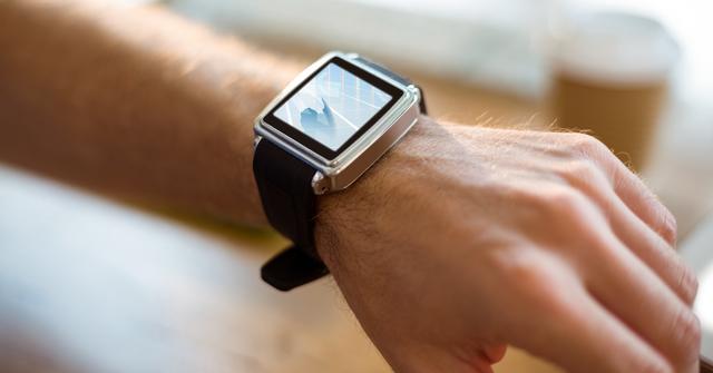 Close-up of smart watch on wrist - Download Free Stock Photos Pikwizard.com