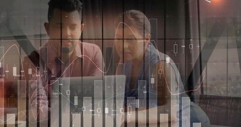 Business duo reviewing financial charts over coffee in modern cafe with dessert