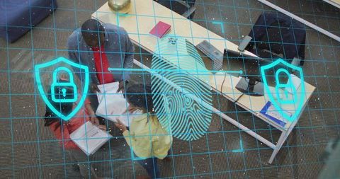 Team Collaborating on Documents with Cybersecurity Fingerprint Overlay in Modern Office