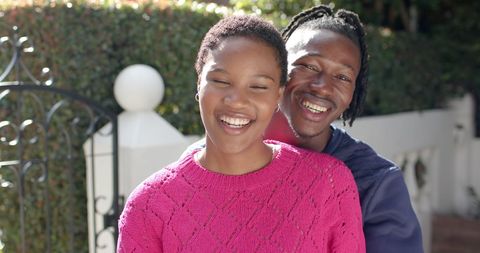 Joyful African American Couple Embracing in Sunny Garden - Download Free Stock Images Pikwizard.com