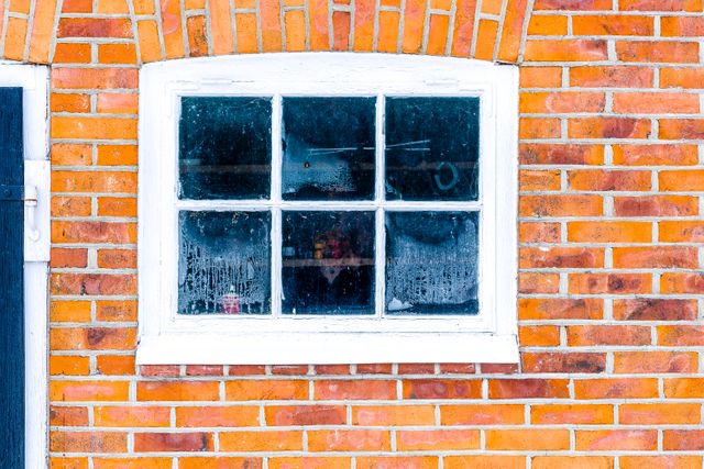 Rustic brick wall with vintage window - Download Free Stock Photos Pikwizard.com