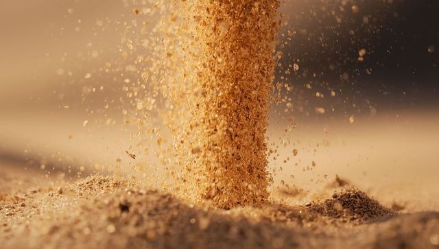 Wood Shavings Cascading in Air Creating Fragrant Dust