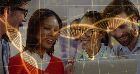 Biotech team collaborating over laptop with golden dna helix overlay for genomics