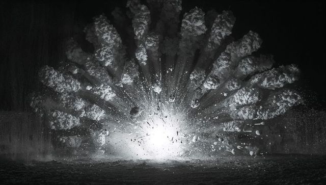 Dynamic Foam Plume Explosion Over Water at Night