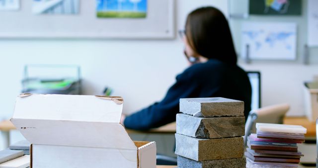 Architect Desk with Brick Samples and Cardboard Box - Download Free Stock Images Pikwizard.com