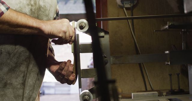 Artisan Working With Metal Grinder in Workshop - Download Free Stock Images Pikwizard.com