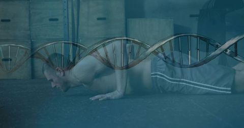 Male athlete doing push-up with dna helix overlay representing genetic fitness training