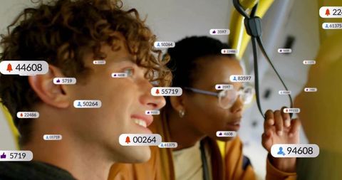 Young commuters standing on bus looking at window with floating social media notifications