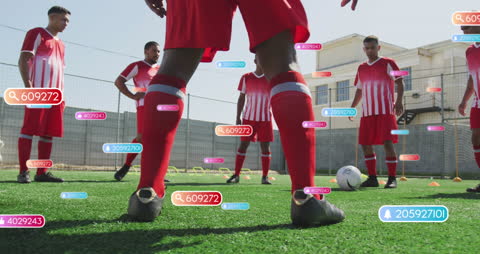Digital Media Icons Overlay Soccer Players on Field