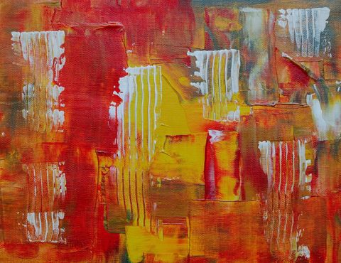 Fiery geometric abstract acrylic texture in warm red yellow with bold white accents