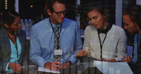 Business Professionals Engaged in Nighttime Financial Discussion