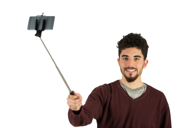 Smiling Young Man Taking Selfie with Selfie Stick on Transparent Background - Download Free Stock Videos Pikwizard.com