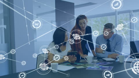 Diverse Team Discussing Digital Network Solutions in Modern Office