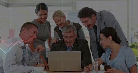 Executive guiding team around laptop revealing sales chart growth and collaborative success
