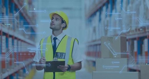 Warehouse Supervisor Managing Inventory with Digital Technology