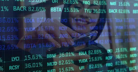 woman using payment terminal overlaid with digital finance data - Download Free Stock Images Pikwizard.com