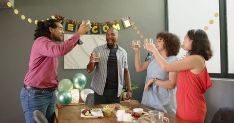 Diverse Friends Celebrating at Joyful Welcome Party