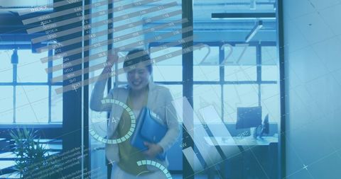 Ecstatic Asian Businesswoman Celebrating Financial Success