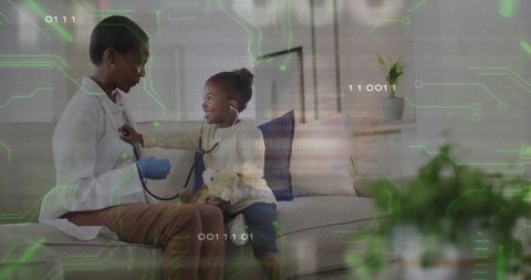 Child listening to clinician while playing doctor during home health visit with stuffed toy