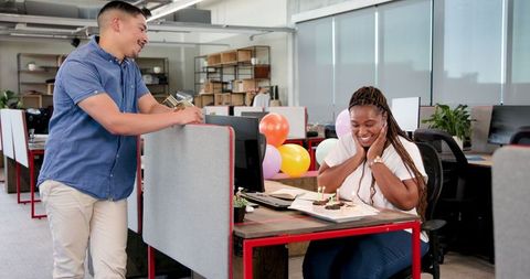 Office Birthday Celebration with Relaxed Colleagues and Cake