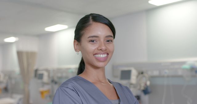 Smiling Nurse in Hospital Ward with Medical Equipment - Download Free Stock Images Pikwizard.com