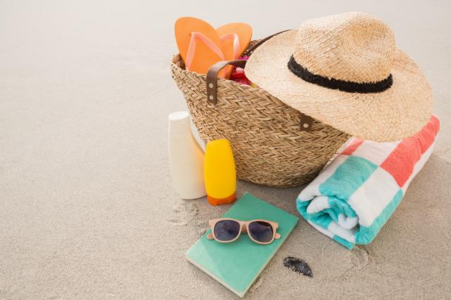 Perfect for travel blogs, vacation advertisements, and summer-themed promotions. Highlights essential items for a beach trip, evoking a sense of relaxation and leisure.