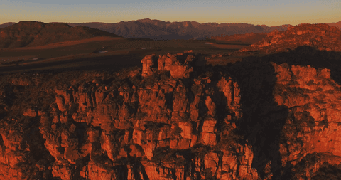 stunning rocky mountainscape in transparent sunset glow - Download Free Stock Videos Pikwizard.com