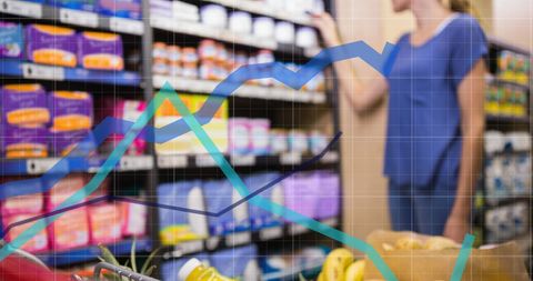 Woman Shopping with Overlaid Stock Market Charts in Supermarket