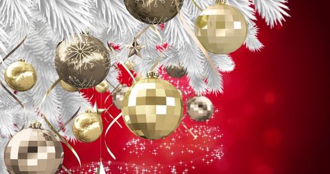 Festive Gold Christmas Ornaments on White Pine With Red Sparkle Background