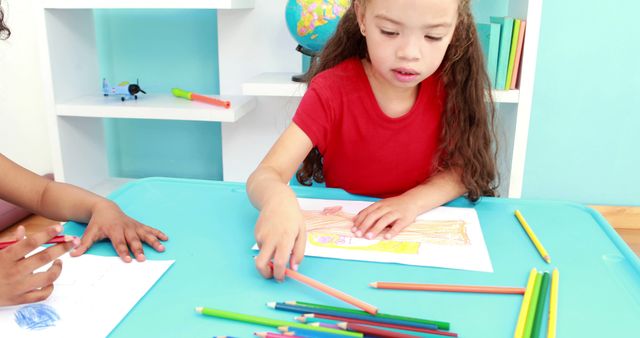 Biracial Preschool Girl Drawing at Childcare Table - Download Free Stock Images Pikwizard.com