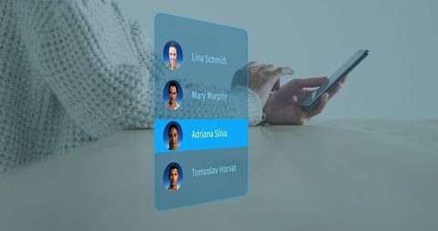 Woman Tapping Smartphone Viewing Augmented Reality Contact List with Highlighted Name
