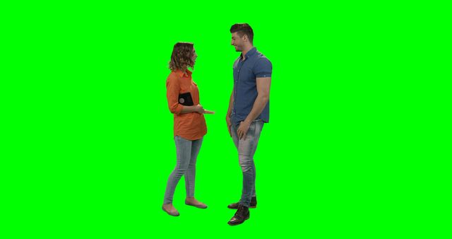 Smiling couple conversing in casual attire, isolated against green screen background. Useful for composite photography, advertisements, relationship counseling illustrations, communication materials, or any creative project requiring green screen removed subjects.